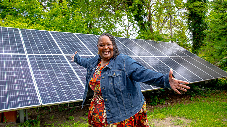 woman with solar panels